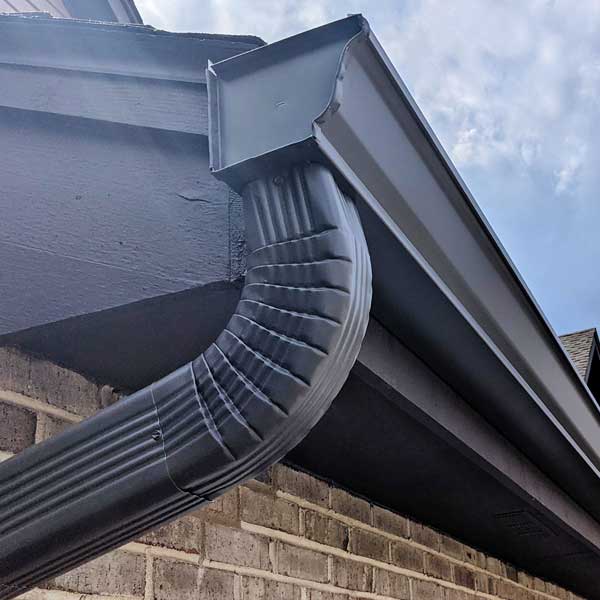 Seamless gutter and downspout installation on a New Jersey home by Warner Exteriors & Solar.