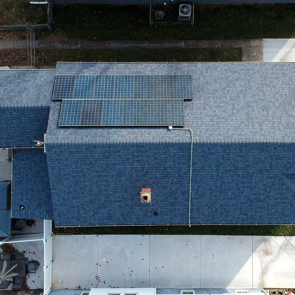 Solar roofing system installed by Warner Exteriors & Solar on a residential home in New Jersey.